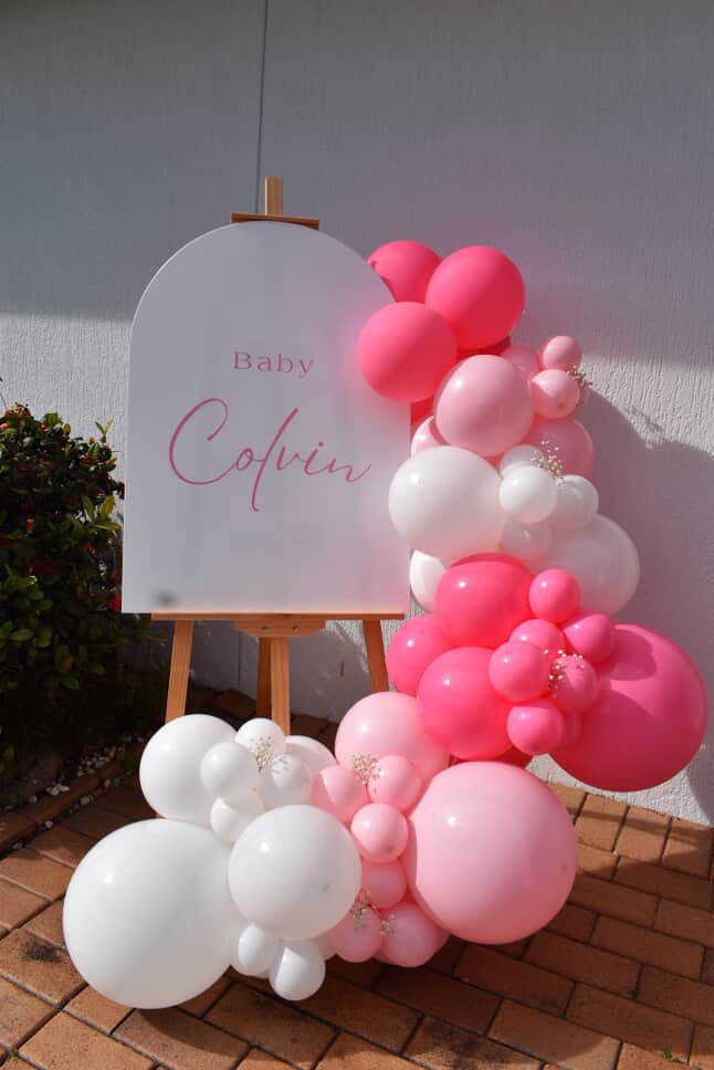 Welcome sign with balloon garland