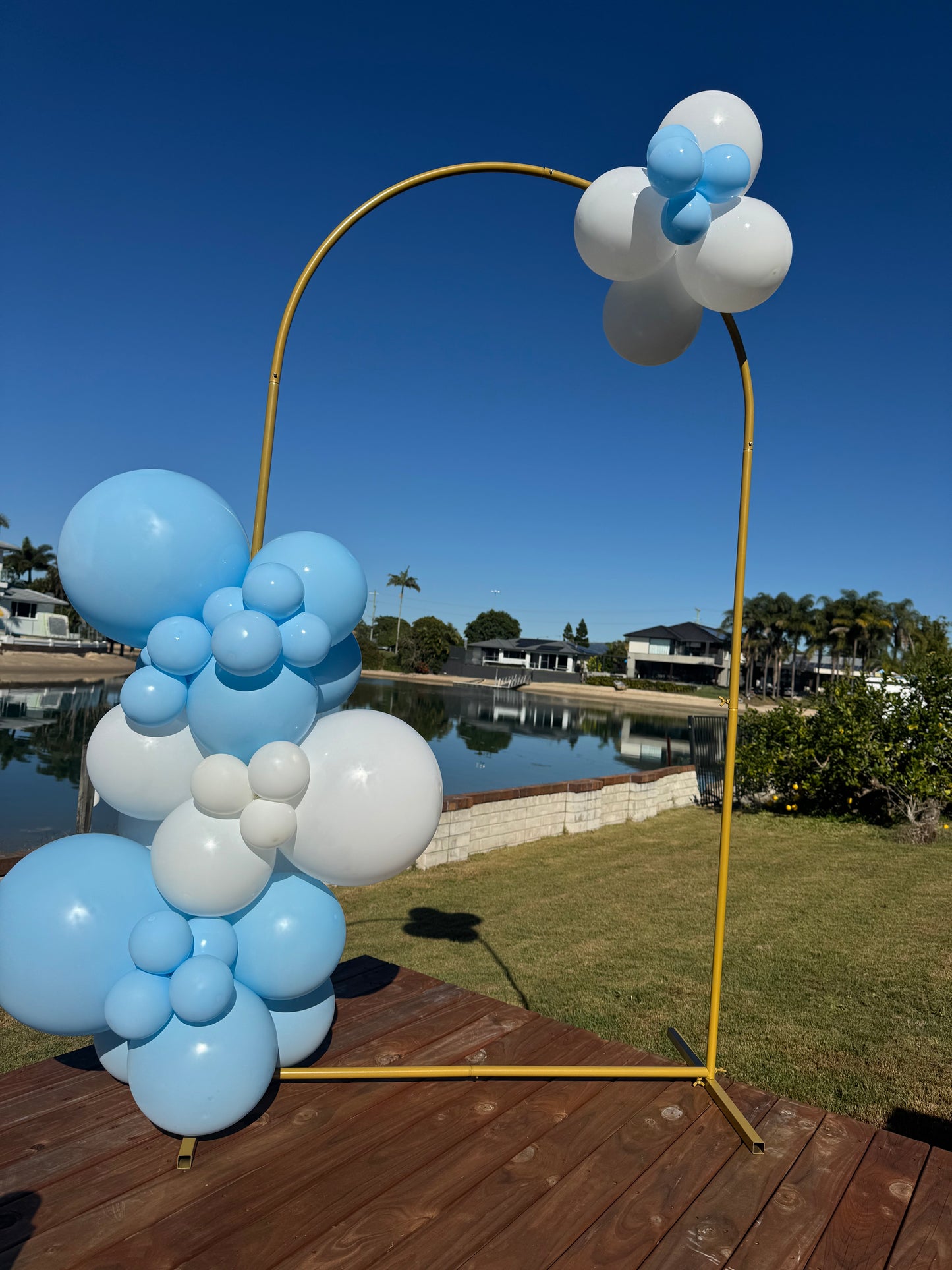 Gold arch with medium balloon garland attached