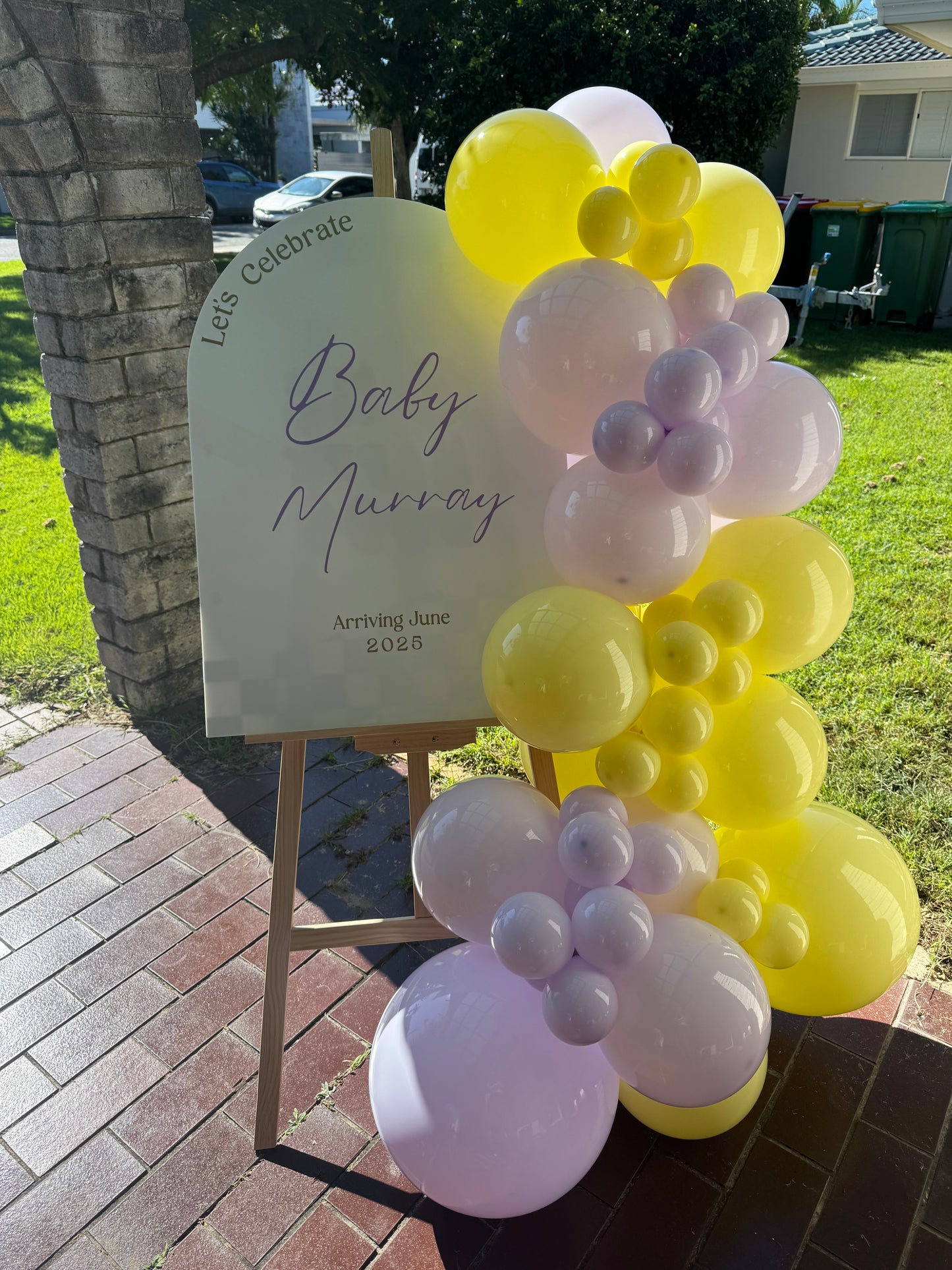 Welcome sign with balloon garland